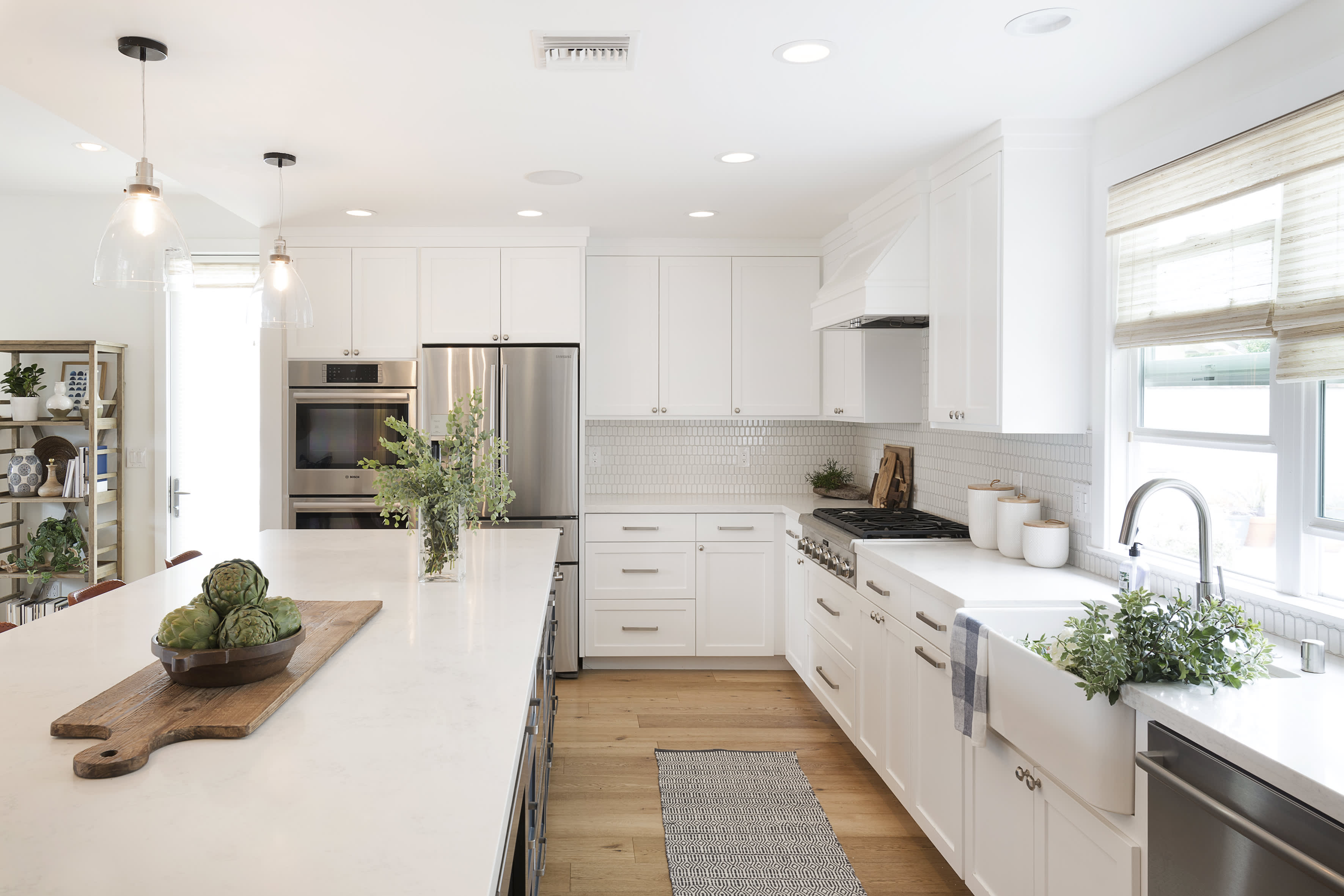 transitional kitchen with white cabinet and purple wall